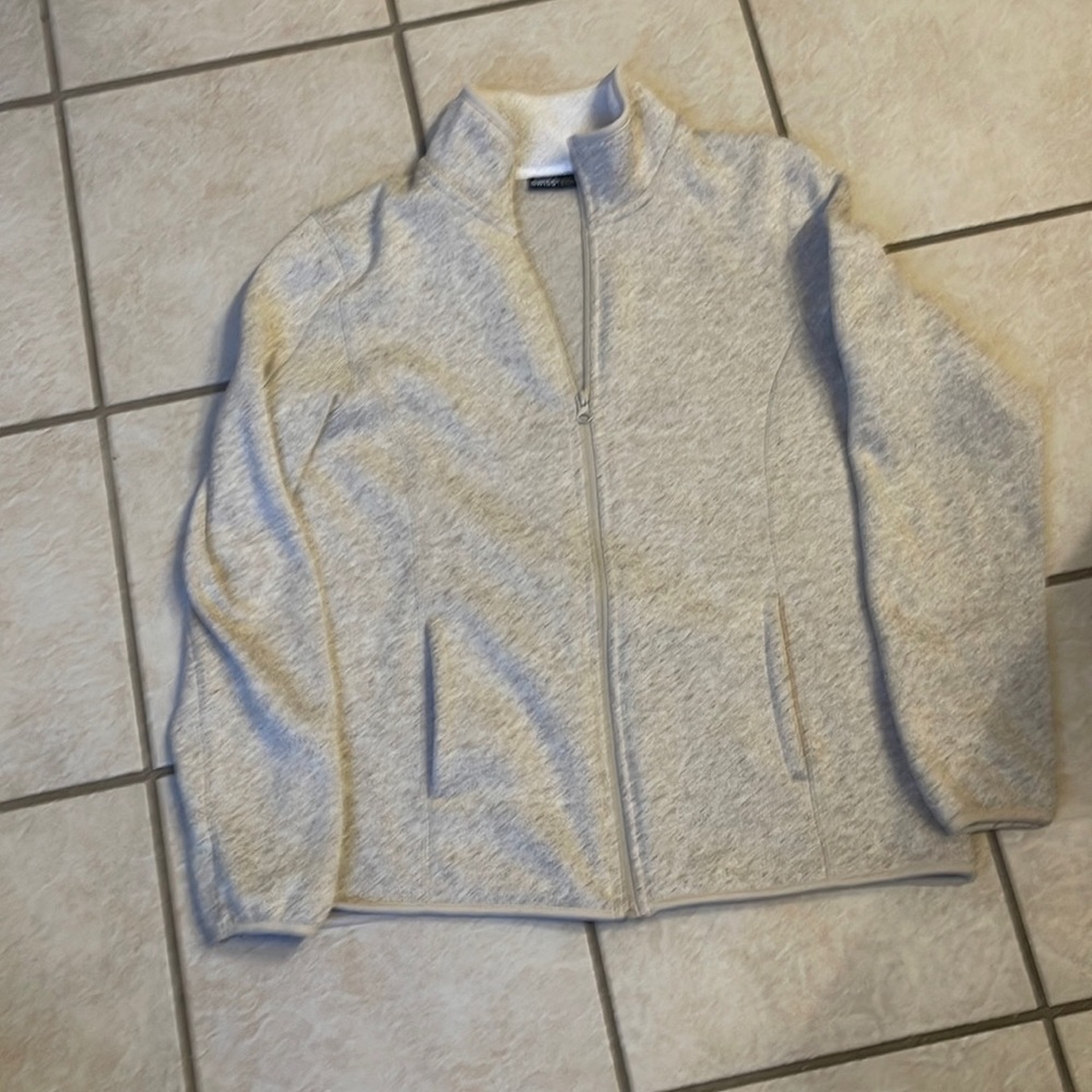 Swiss tech feels like “flannel” jacket. Cream color.